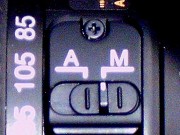 Focus switch on lens